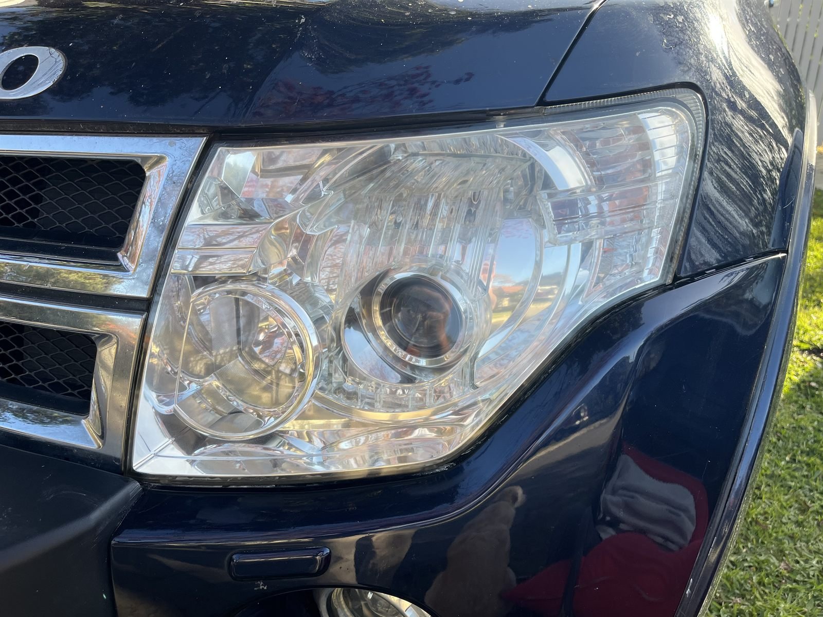 Mitsubishi Pajero headlight after restoration — clear and restored